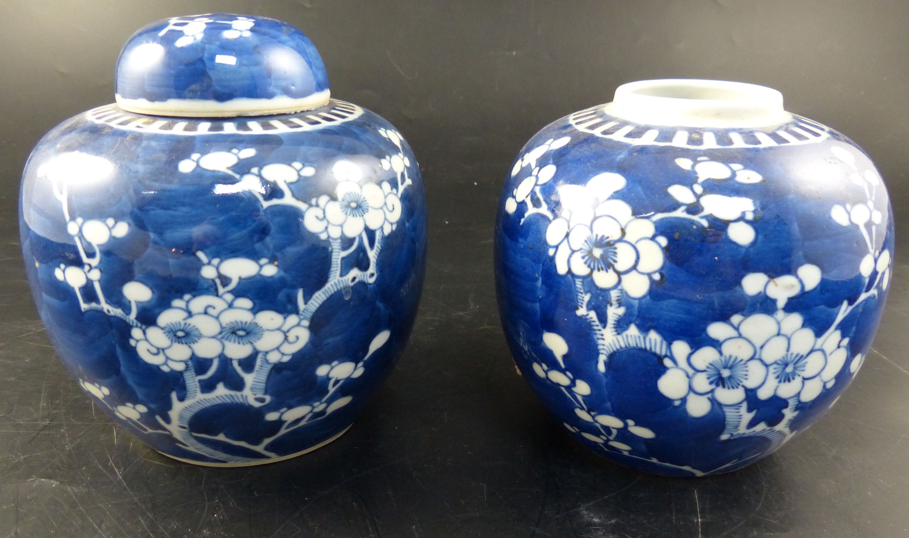 A pair of Chinese blue and white ginger jars, overall height 14cm